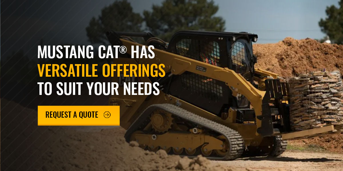 a yellow bulldozer on dirt